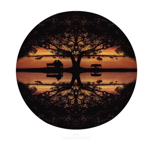 Circular fine art photograph, mirrored sunset with tree and couple on bench